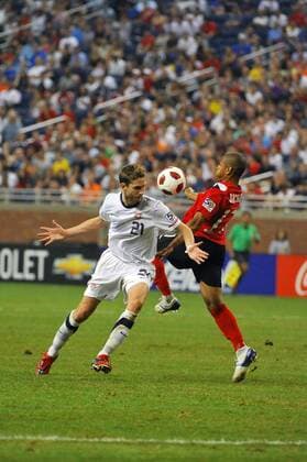 June 7, 2011 - Detroit, MI United States defender Clarence Goodson (21) gets pushed off of the ball by Canada forward Simeon Jackson (17) in the second half of the CONCACAF Gold Cup First Round game on Tuesday evening at Ford Field, Detroit, Michigan. USA v Canada SOCCER: JUN 07 CONCACAF Gold Cup - First Round - USA v Canada Icon2581106070034 EDITORIAL USE ONLY