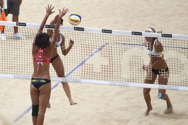 12.06.2011 Day one of the Beach Volleyball World Championships from Rome - Stefanie and Doris Schwaiger VS Ying Huang (CHN) xEmanuelexPennacchiox  ActionPlus11182279 Content restricted for UK based newspaper
