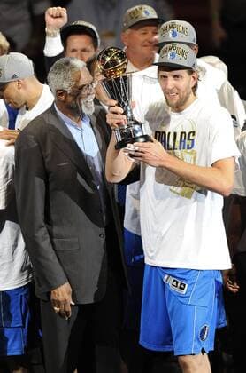12 June 2011: Dallas Mavericks Dirk Nowitzki accepts the MVP Trophy from Bill Russell as he celebrates the defeat of the Miami Heat following game 6 of the NBA Basketball Herren USA Finals between the Dallas Mavericks at the Miami Heat at the American Airlines Arena in Miami, Florida. NBA Basketball Herren USA JUN 12 NBA Basketball Herren USA Finals - Game 6 - Mavericks at Heat Icon35811061205136 o0 Pokal Trophäe Objekte EDITORIAL USE ONLY