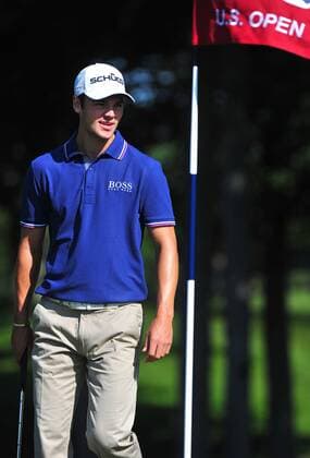 Martin Kaymer of Germany lines up a putt on the 9th green during a practice round prior to the U.S. Open at Congressional Country Club in Bethesda, Maryland on June 14, 2011.  WAP20110614307