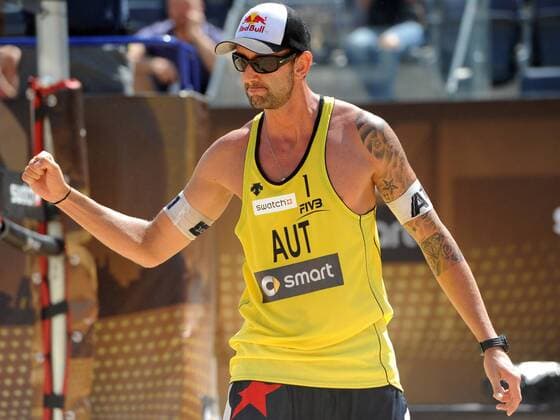 BEACHVOLLEYBALL - FIVB WM 2011 ROM,ITALIEN,17.JUN.11 - DIVERS, BEACH VOLLEYBALL - FIVB Weltmeisterschaften, Herren. Bild zeigt den Jubel von Clemens Doppler (AUT). Keywords: Tattoo. 