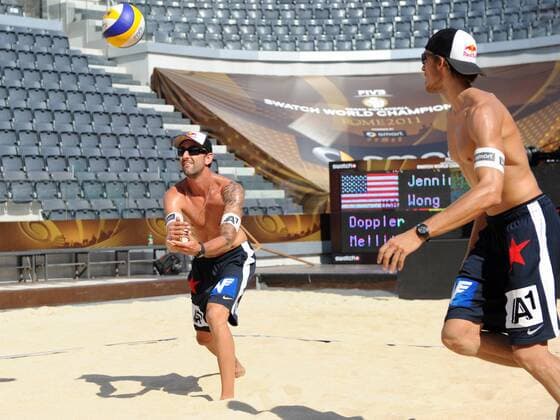 BEACHVOLLEYBALL - FIVB WM 2011 ROM,ITALIEN,17.JUN.11 - DIVERS, BEACH VOLLEYBALL - FIVB Weltmeisterschaften, Herren. Bild zeigt Clemens Doppler und Matthias Mellitzer (AUT) beim Aufwärmen. 