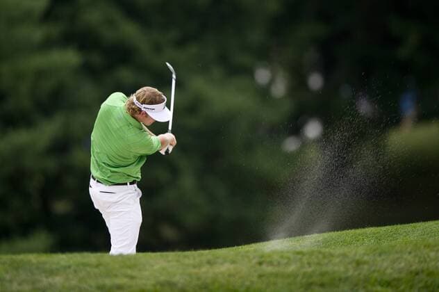 June 18, 2011 - Bethesda, Maryland, U.S. - BRANDT SNEDEKER hits out of a fairway bunker on the 15th hole at Congressional Country Club during the third round of the U.S. Open in Bethesda, MD. Golf 2011- US Open Third Round - ZUMAmv2