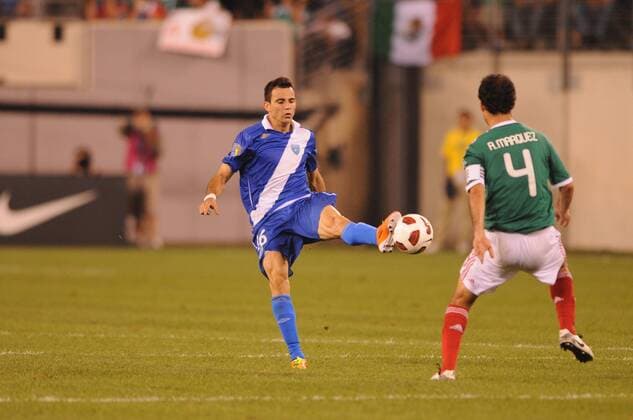 June 18, 2011 - East Rutherford, New Jersey, U.S - Guatemala s Marco Pappa (16) controls a ball away from Mexico s Rafael Marquez (4)during second half CONCACAF Gold Cup soccer quarterfinal action where Mexico defeated Guatemala 2-1 at the New Meadowlands Stadium in East Rutherford, N.J. CONCACAF Gold Cup Soccer - June 18 - Mexico vs Guatemala - ZUMAx50