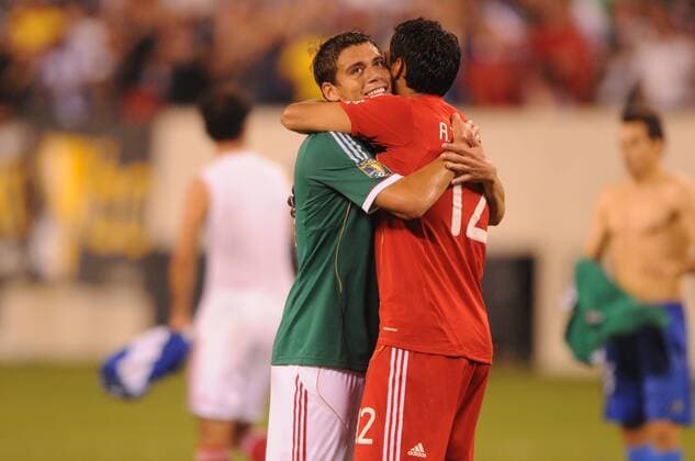 June 18, 2011 - East Rutherford, New Jersey, U.S - Mexico s goalkeeper Alfredo Talavera (12) celebrates with teammate Hector Moreno (15) during second half CONCACAF Gold Cup soccer quarterfinal action where Mexico defeated Guatemala 2-1 at the New Meadowlands Stadium in East Rutherford, N.J. CONCACAF Gold Cup Soccer - June 18 - Mexico vs Guatemala - ZUMAx50