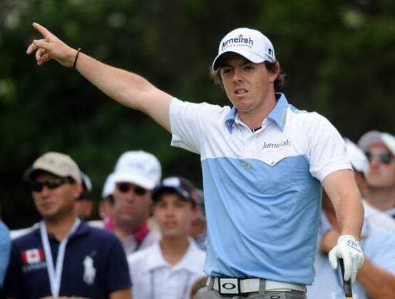 Northern Ireland s Rory McIlroy points right as hist his tee shot on No. 3 goes in the rough during the third round of the U.S. Open golf championship at Congressional Country Club in Bethesda, Maryland on June 18, 2011. He scrambled to make par on the hole. McIlroy started the day in first place at 11 under par.  WAP20110618110
