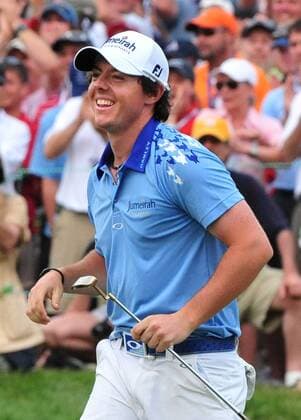 Northern Ireland s Rory McIlroy reacts after almost making a long putt for birdie on the 18th hole at the U.S. Open Championship at Congressional Country Club in Bethesda, Maryland on June 19, 2011. McIlroy went on to win the championship , setting a new U.S. Open record.  WAP20110619334