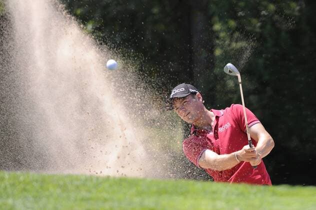 Martin KAYMER (GER),Golfprofi,Golf,Einzelbild,Einzelaktion,angeschnittenes Einzelmotiv, Bunkerschlag,Sandbunker,Sand,BMW International Open 2011 in Muenchen Eichenried.