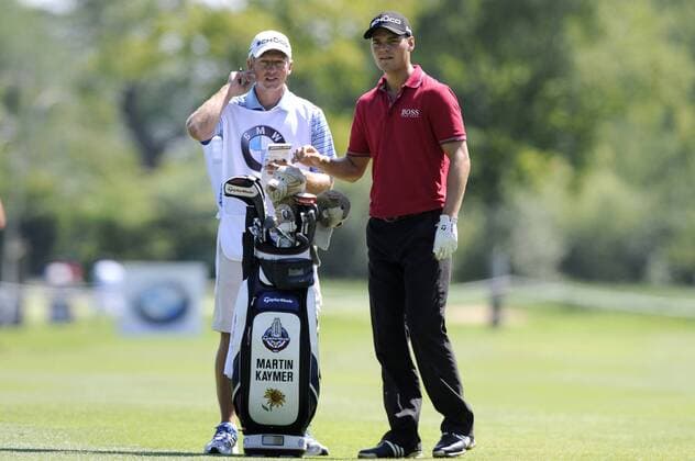 Martin KAYMER (GER),Golfprofi,Golf, mit seinem Caddy Christian Donald (Bruder von Luke Donald), Ganzkoerperfigur, BMW International Open 2011 in Muenchen Eichenried.