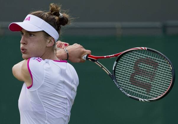 Tennis: Wimbledon Championship 2011, Andrea Petkovic from Germany in action during her second round match on Day Three of the Wimbledon Lawn Tennis Championships at the All England Lawn Tennis and Croquet Club, June 22, 2011, London, England. xHOCHxZWEIx xKirstenxHolstx