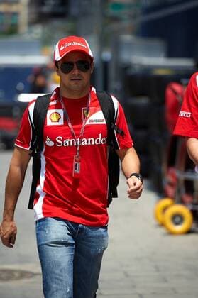 23.06.2011 Formula 1 Grand Prix from the Valencia Street Circuit in Spain. Felipe Massa walks through the paddock. xXaumexOllerosx  ActionPlus11186334 Content restricted for UK based newspaper