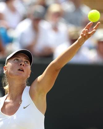 LONDON, June 27, 2011 -- Maria Sharapova of Russia serves the ball during the women s singles fourth round match at the 2011 Wimbledon tennis championships in London, England, June 27, 2011. 