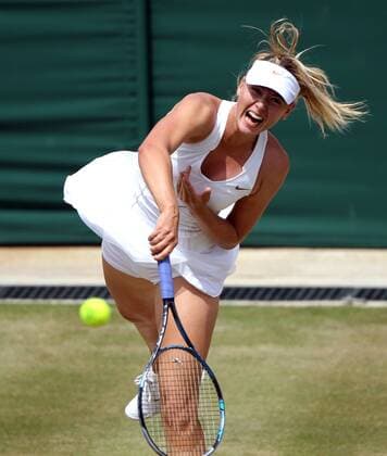 LONDON, June 27, 2011 -- Maria Sharapova of Russia serves the ball during the women s singles fourth round match at the 2011 Wimbledon tennis championships in London, England, June 27, 2011. 