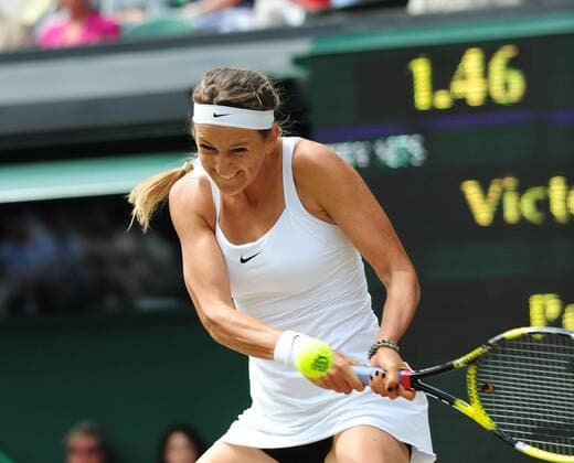 LONDON, June 30, 2011 -- Petra Kvitova of the Czech Republic hits a return during her semifinal match in 2011 s Wimbledon Tennis Championships in London, Great Britain, June 30, 2011. 
