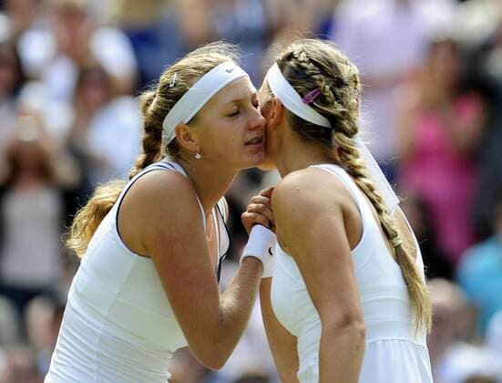 LONDON, June 30, 2011 -- Petra Kvitova(L) of the Czech Republic greets Victoria Azarenka of Belarus after winning her semifinal match in 2011 s Wimbledon Tennis Championships in London, Great Britain, June 30, 2011. 