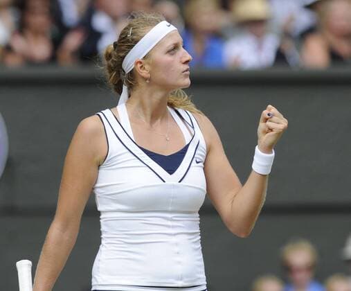 Czech Petra Kvitova reacts in her match in the Women s Final of the 125th Wimbledon Championships in Wimbledon,England on July 2, 2011.  LON2011070230