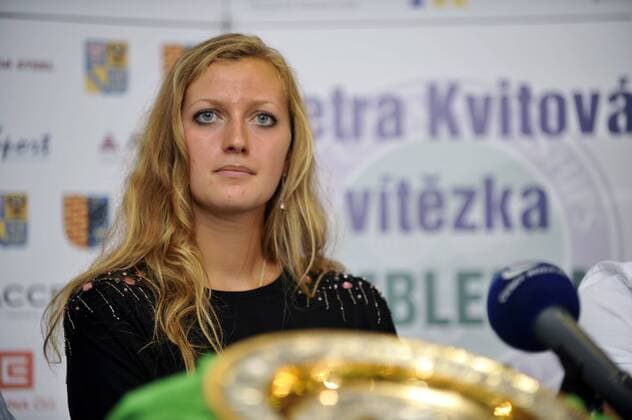 Czech tennis player Petra Kvitova, who won ladies singles final at the All England Lawn Tennis Championships at Wimbledon, poses with the trophy after her presser in Prostejov on Monday, July 4, 2011. (CTKxPhoto VladislavxGalgonek)  CTKPhoto8201107040645801