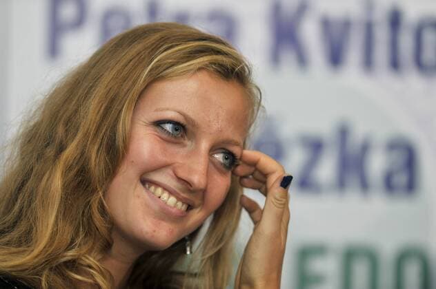 Czech tennis player Petra Kvitova, who won ladies singles final at the All England Lawn Tennis Championships at Wimbledon, poses with the trophy after her presser in Prostejov on Monday, July 4, 2011. (CTKxPhoto VladislavxGalgonek)  CTKPhoto8201107040645701