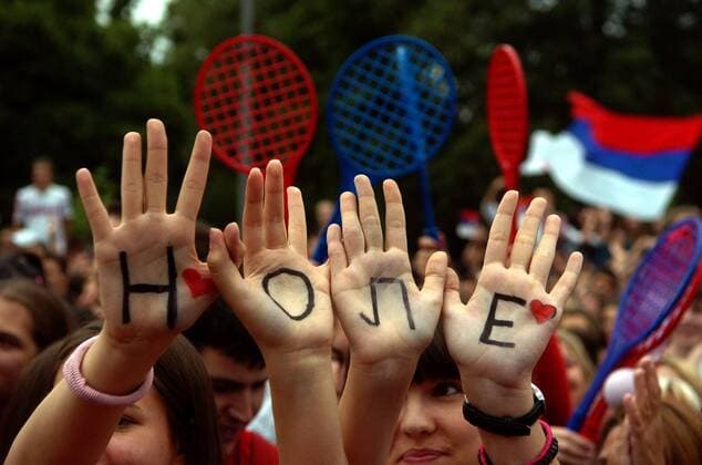 04.07.2011 Belgrade(Serbia) Serbian tennis fans with cyrilic letters NOLE ( nick name of Novak Djokovic) in front of national parliament during celebration of Novak Djokovic Wimbledon championships trophy : 