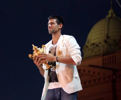04.07.2011 Belgrade(Serbia) Novak Djokovic 1st tennis player at the moment on ATP Tennis Herren list celebrate with Serbian Wibledon championships trophy in front of Serbian parliament :  o0 Pokal Trophäe,