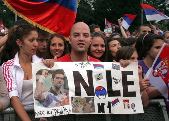 04.07.2011 Belgrade(Serbia) People celebrate Wimbledon champion title of Novak Djokovic in front of Serbian parliament :  o0 fan
