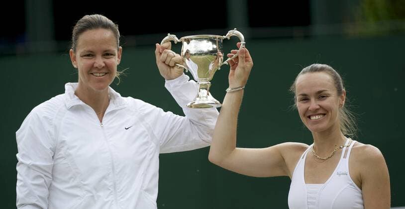 Tennis: Wimbledon Championship 2011, Lindsay Davenport (USA) and Martina Hingis (SUI) celebrate with the trophy after winning the Ladies Invitation Doubles Final match on day thirteen of the Wimbledon Lawn Tennis Championships at the All England Lawn Tennis and Croquet Club. xHOCHxZWEIx xPropagandax  o0 Sieg, Sieger Siegerehrung Pokal, Trophäe Objekte