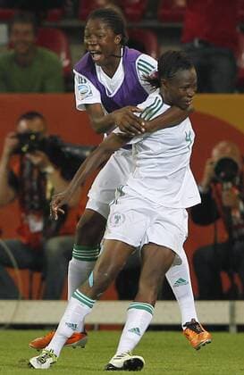 Nigeria s Perpetua Nkwocha (front) celebrates after scoring during the Group A third round match against Canada at the 2011 FIFA Women s World Cup at the Rudolf-Harbig-Stadion in Dresden, Germany, July 5, 2011. Nigeria won the match 1-0. Neither team advanced to the next round. (Xinhua Ding Xu) GERMANY-DRESDEN-2011 FIFA WOMEN S WORLD CUP-GROUP A-CAN VS NGA 