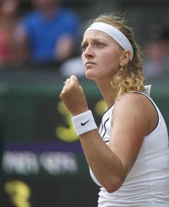 Tennis: Wimbledon Championship 2011, Petra Kvitova (CZE) celebrates winning a point during the Ladies Singles Final on day twelve of the Wimbledon Lawn Tennis Championships at the All England Lawn Tennis and Croquet Club. xHOCHxZWEIx xPropagandax 