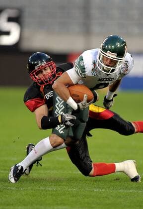 AMERICAN FOOTBALL - IFAF WM 2011, GER vs MEX INNSBRUCK,AUSTRIA,08.JUL.11 - DIVERS, AMERICAN FOOTBALL - IFAF Weltmeisterschaft, Länderspiel, Deutschland vs Mexiko. Bild zeigt Clemens Sommerfeld (GER) und Jose Antonio Alfonso (MEX). 
