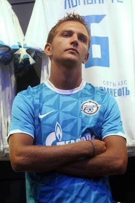 ITAR-TASS: ST PETERSBURG, RUSSIA. JULY 8, 2011. Former Genoa defender Domenico Criscito talks to reporters at FC Zenit s flagship store at Nevsky Prospekt. The Italian football player, who signed a five year contract with FC Zenit in June, has arrived in Russia s northern capital to join his new team and begin preparations for the new season.  RE0EA4B7