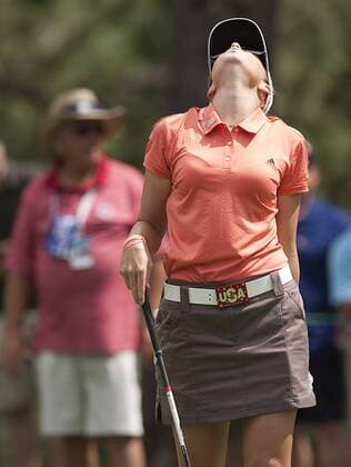 Defending US Open champion Paula Creamer reacts after tee shot on the eleventh hole during the third round of the U.S. Women s Open at the Broadmoor East Course in Colorado Springs on July 10, 2011.  COS2011071020
