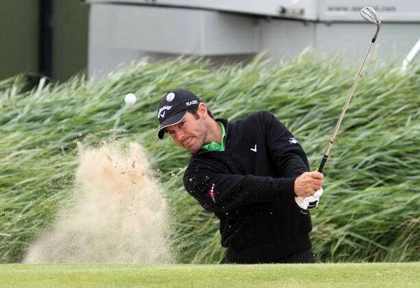 South African Trevor Immelman plays out of a bunker during practice day in the 140th Open Championship at Royal St Georges Golf club in Sandwich,England on Tuesday, July 12, 2011.  LON2011071205