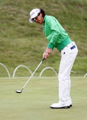 Japan s Ryo Ishikawa putts during practice day in the 140th Open Championship at Royal St Georges Golf club in Sandwich,England on Tuesday, July 12, 2011.  LON2011071215