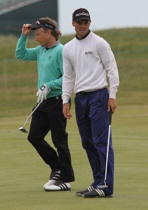 Germany s Bernhard Langer and Martin Kaymer at practice day in the 140th Open Championship at Royal St Georges Golf club in Sandwich,England on Tuesday, July 12, 2011.  LON2011071219
