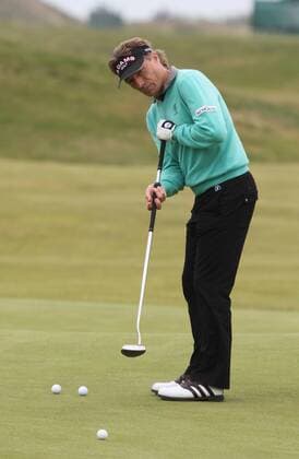 Germany s Bernhard Langer putts during practice day in the 140th Open Championship at Royal St Georges Golf club in Sandwich,England on Tuesday, July 12, 2011.  LON2011071220