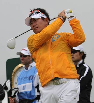 South Korea s Y.E. Yang tees off during practice day in the 140th Open Championship at Royal St Georges Golf club in Sandwich,England on Tuesday, July 12, 2011.  LON2011071223