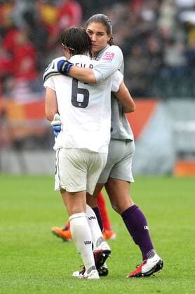 Amerika s goalkeeper Hope SOLO (R) celebrates the victory with Amerika s Amy LE PEILBET during the semifinal match of the Women s Soccer World Cup between USA and France, Borussiapark in Moenchengladbach on July 13., 2011. Mika LePeilbet