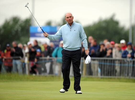 Golf - The Open 2011 - Royal St George s Thomas Bjorn (DEN) waves to the crowd as he completes his first round in 65 to give him the early lead at Royal St George s, Sandwich 