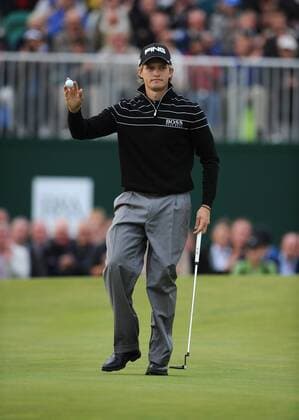 Golf - The Open 2011 - Royal St George s Tom Lewis acknowledges the crowd on the 18th green after posting a score of 65 to share the lead at the end of day one at Royal St George s, Sandwich 