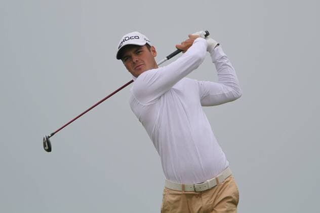 Germany s Martin Kaymer tees off on the 12th hole on the first day of the 140th Open Championship at Royal St Georges Golf club in Sandwich, England on Thursday, July 14, 2011.  LON2011071421