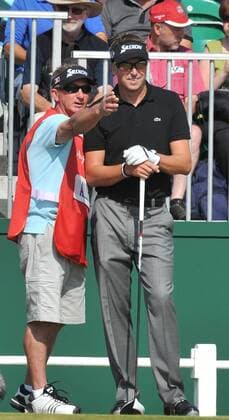 15.07.2011 Action from Royal St Georges, Sandwich, Kent on the second day of the British Open Championship Robert Allenby of Australia consults his caddy on the first xStevexButlerx  ActionPlus11194259 Content restricted for UK based newspaper