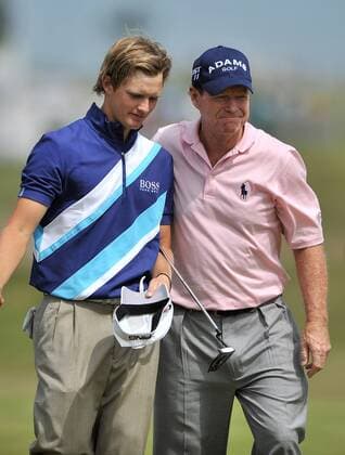 Golf - The Open 2011 - Royal St George s - Day 2 Tom Lewis (GBR) and Tom Watson (USA) leave the 18th having finished their second rounds at Royal St George s, Sandwich 