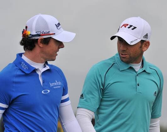 17.07.2011 Action from Royal St Georges , Sandwich , Kent on the fourth day of the British Open Championship Rory McIlroy and Sergio Garcia enjoy a chat during their round xStevexButlerx  ActionPlus11194870 Content restricted for UK based newspaper