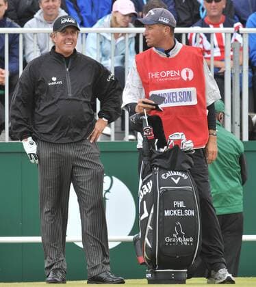 17.07.2011 Action from Royal St Georges , Sandwich , Kent on the fourth day of the British Open Championship. Phil Mickelson jokes with his caddy on the tee xStevexButlerx  ActionPlus11194877 Content restricted for UK based newspaper