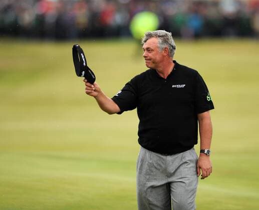 Golf - The Open 2011 - Royal St George s - Day 4 Darren Clarke acknowledges the crowd as he walks up to the 18th Green, on his way to winning The Open Championship at Royal St George s, Sandwich 