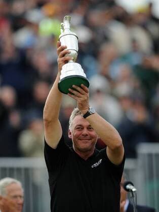 Golf - The Open 2011 - Royal St George s - Day 4 Darren Clarke of Northern Ireland holds aloft The Claret Jug after winning the Open Championshp at Royal St Georges, in Sandwich 