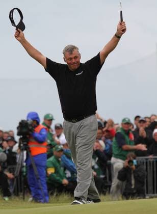 Northern Ireland s Darren Clarke celebrates winning the 140th Open Championship at Royal St Georges Golf club in Sandwich,England on Sunday, July 17, 2011.  LON2011071706