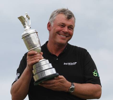 Darren Clarke lifts the claret jug after winning the 140th Open Championship at Royal St Georges Golf club in Sandwich,England on Sunday, July 17, 2011.  LON2011071704