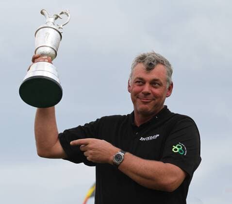 Darren Clarke lifts the claret jug after winning the 140th Open Championship at Royal St Georges Golf club in Sandwich,England on Sunday, July 17, 2011.  LON2011071701