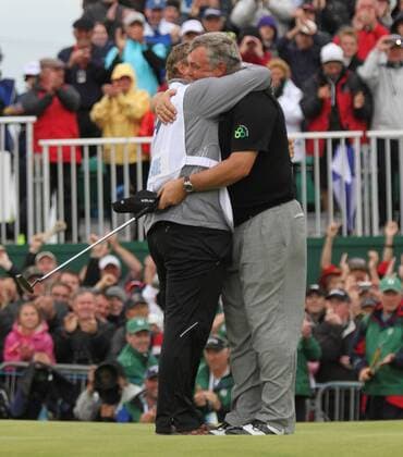 Northern Ireland s Darren Clarke celebrates with his caddie after winning the 140th Open Championship at Royal St Georges Golf club in Sandwich -  LON2011071709 o0 Sieg